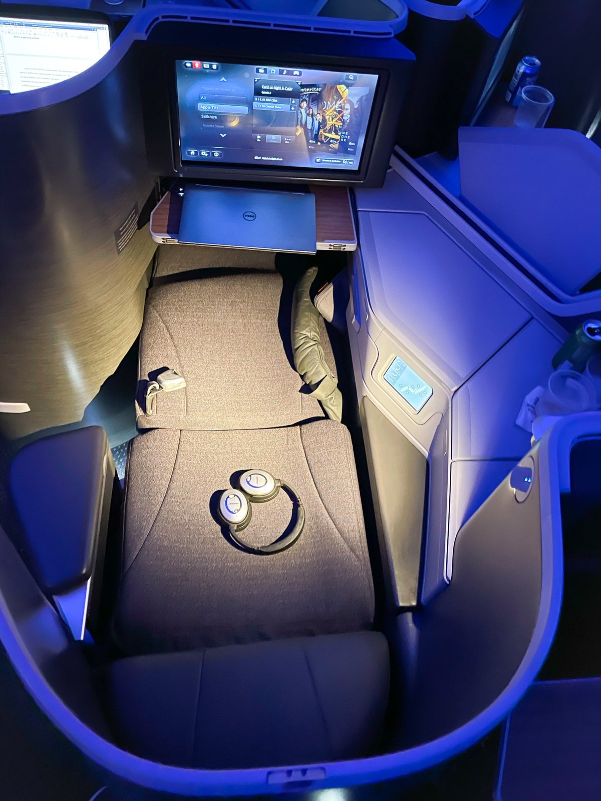 American Airlines First Flagship Business Class Miami to Boston lie flat seat with bose headphones