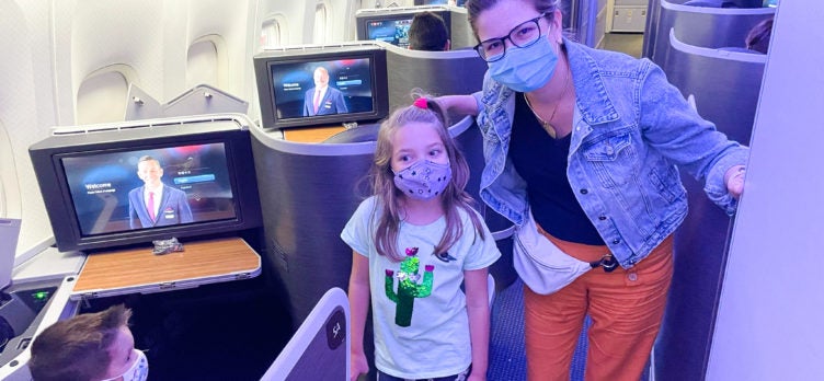 American Airlines First Flagship Business Class Miami to Boston mom and daughter in masks