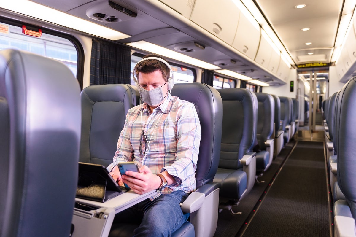 Amtrak Acela passenger on phone