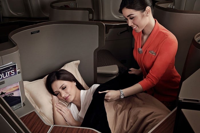 Garuda Indonesia business class flight attendant Garuda Indonesia business class flight attendant