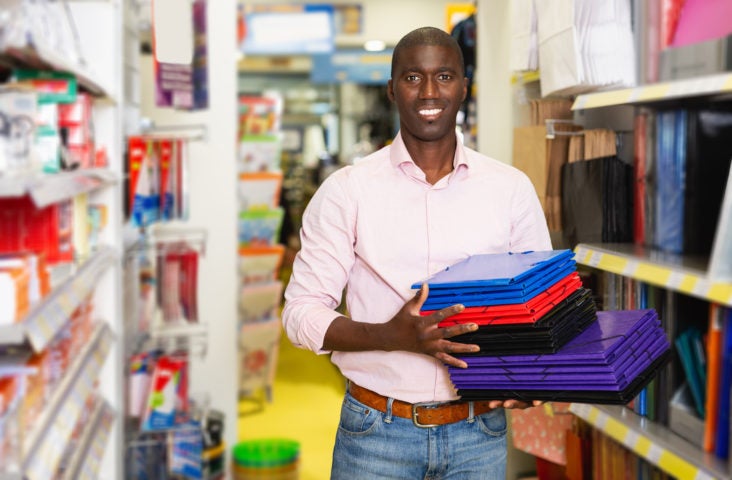 man at office supply stationary store