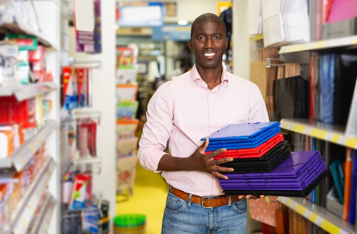 man at office supply stationary store