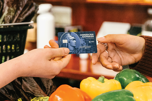 Fruits in a supermarket Amex Blue Cash Preferred card in supermarket