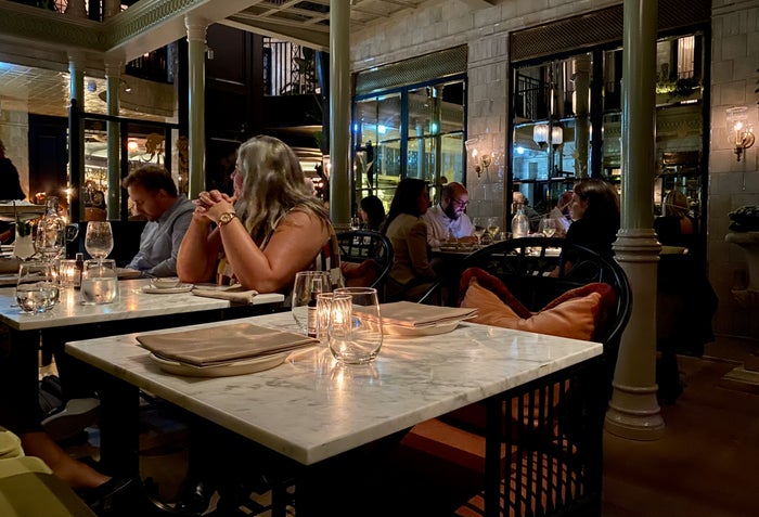 Seated at the The NoMad London restaurant