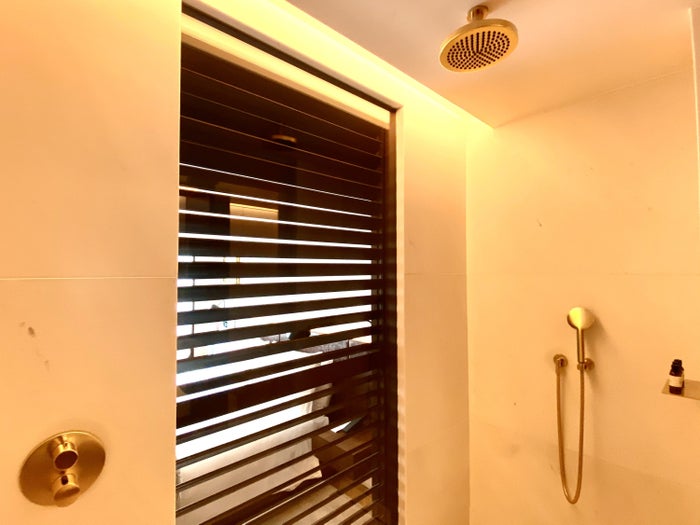 The Barcelona EDITION Deluxe Room bathroom