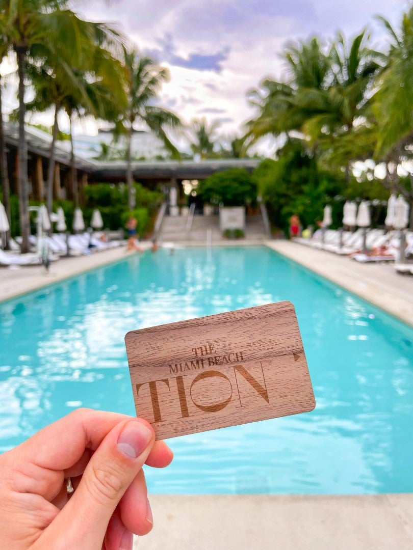 The Miami Beach EDITION room key and modern pool 