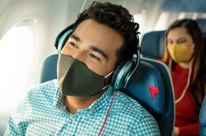 Delta passenger enjoys Spotify