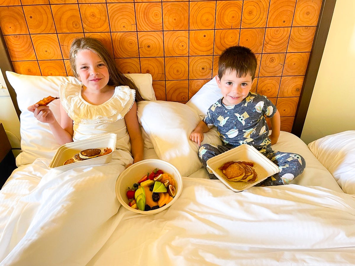Room service breakfast in bed at The Lodge at Spruce Peak Destination by Hyatt Stowe Vermont