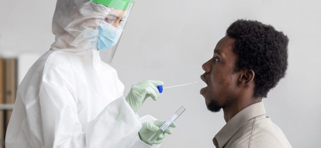 doctor taking coronavirus test sample