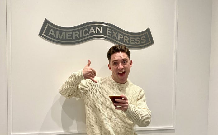 American Express Centurion Lounge Heathrow Terminal 3 espresso martini and American Express logo American Express Centurion Lounge Heathrow Terminal 3 espresso martini and American Express logo