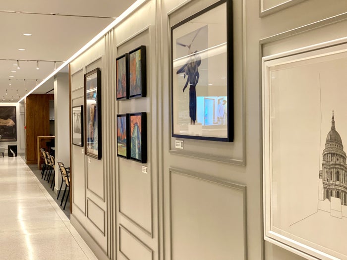 American Express Centurion Lounge Heathrow Terminal 3 hallway of art