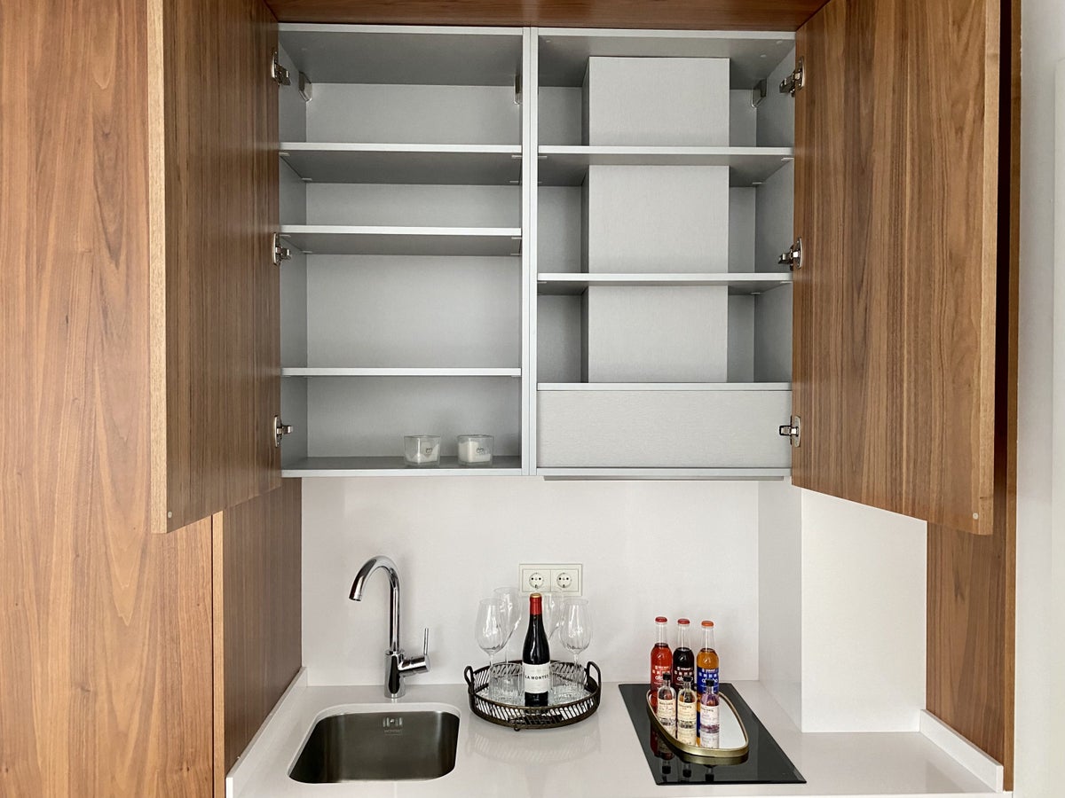 The Atocha Hotel Madrid Tapestry Collection by Hilton El Atochal Penthouse open cupboards in kitchenette