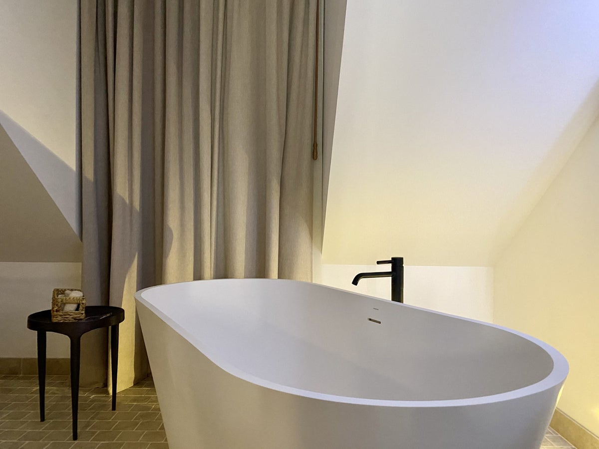 The Atocha Hotel Madrid Tapestry Collection by Hilton El Atochal Penthouse the tub at night