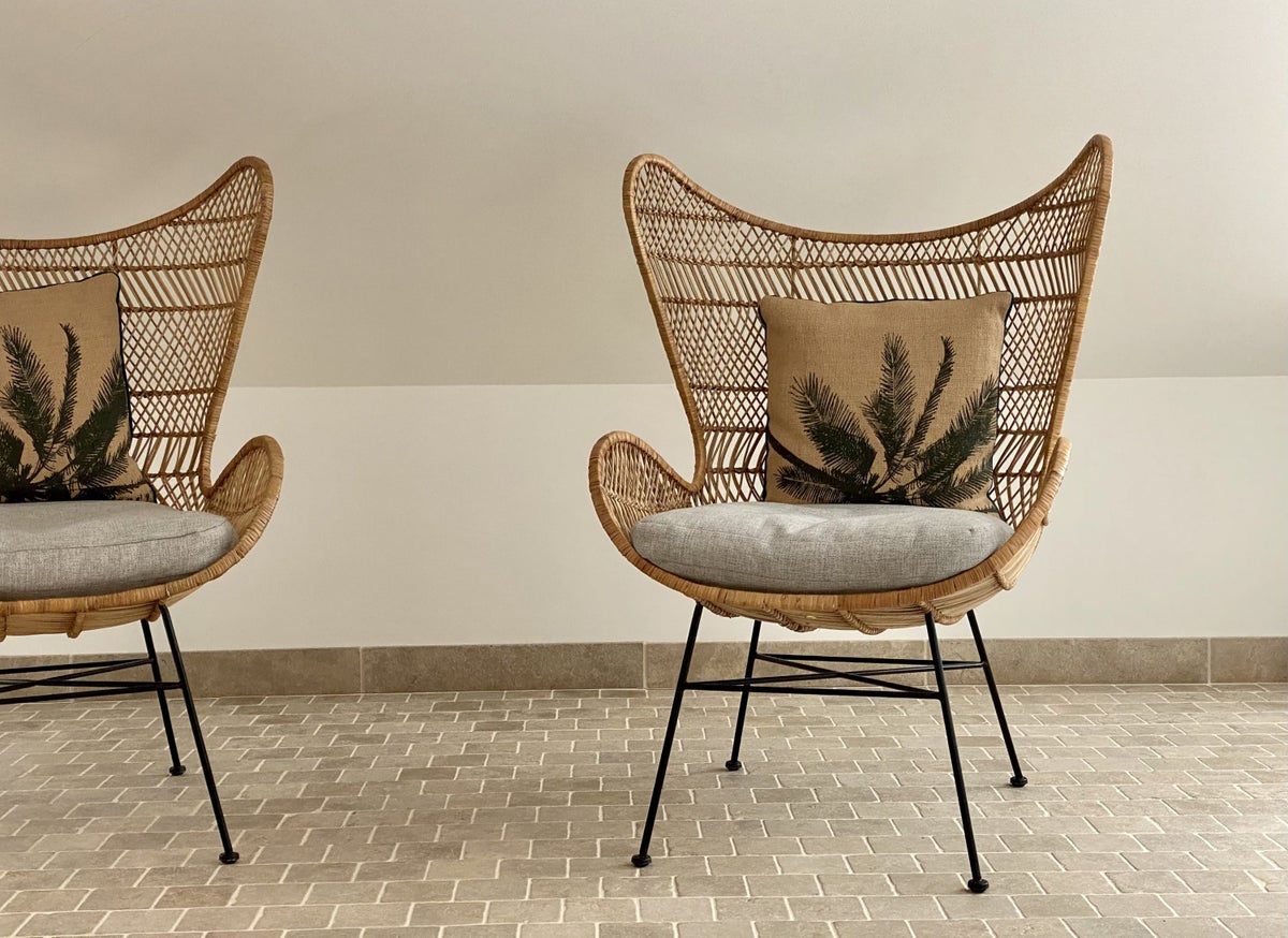 The Atocha Hotel Madrid Tapestry Collection by Hilton El Atochal Penthouse wicker seating