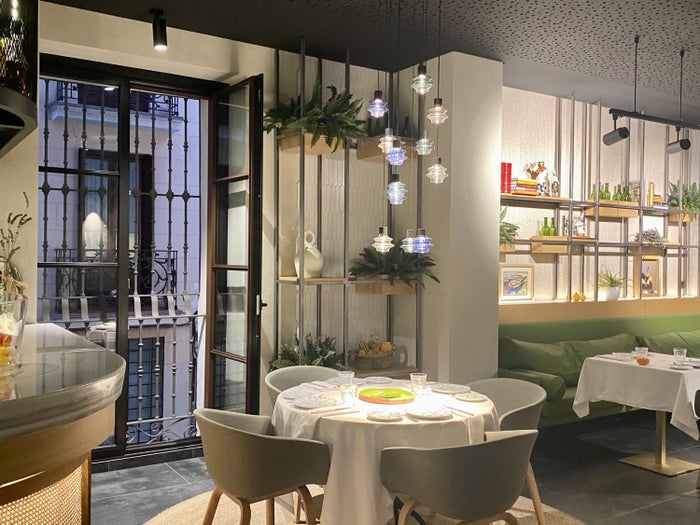 The Atocha Hotel Madrid Tapestry Collection by Hilton the restaurant set up for dinner The Atocha Hotel Madrid Tapestry Collection by Hilton the restaurant set up for dinner