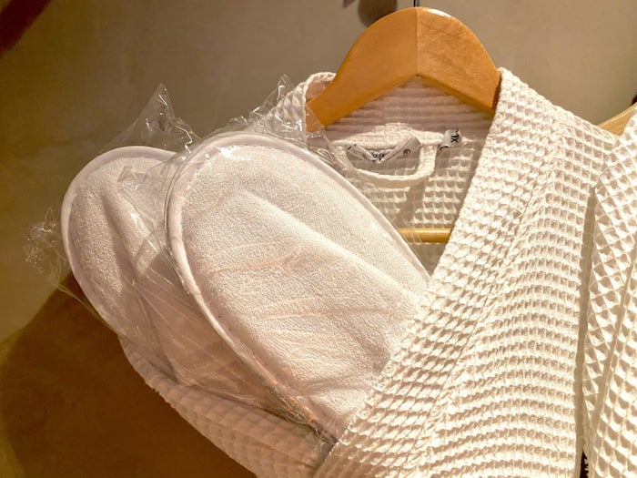Alexandra Hotel Barcelona Curio Collection by Hilton bathroom robe and slippers