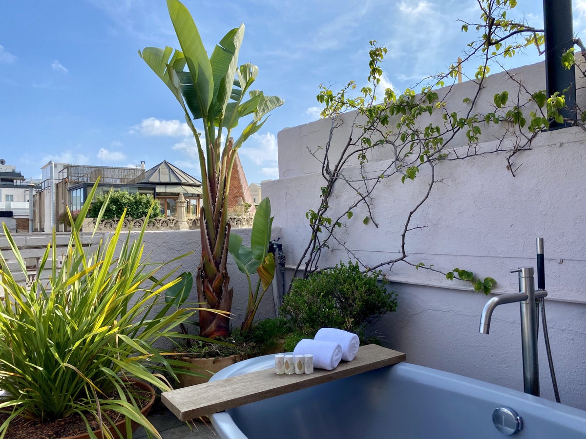 Alexandra Hotel Barcelona Curio Collection by Hilton outside bathtub and plants