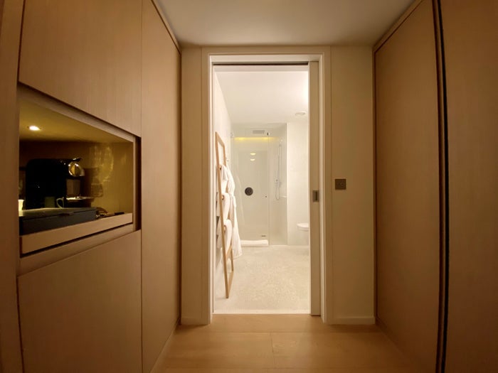 The London EDITION entrance to bathroom