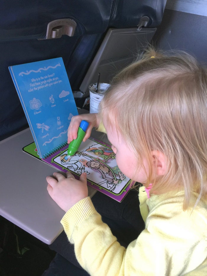 child playing on an airplane