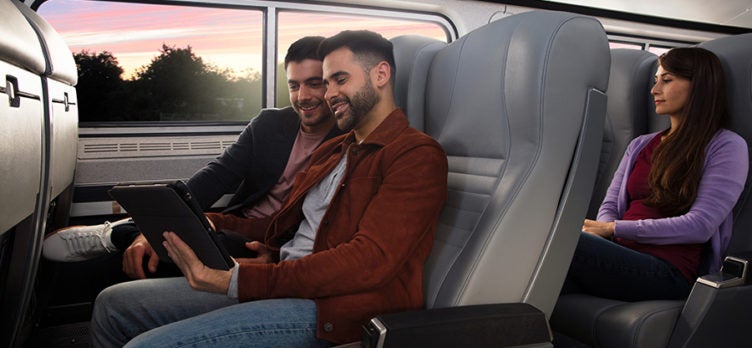 Amtrak couple coach sunset