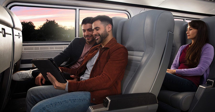 Amtrak couple coach sunset