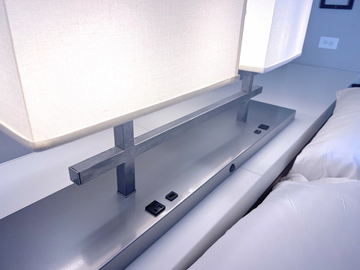 Bed lamp with charging ports