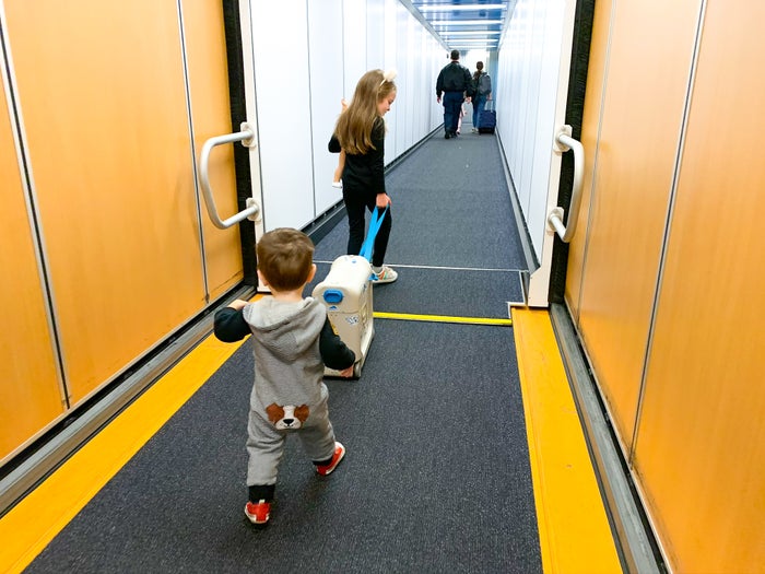 Kids on jetbridge with JetKids BedBox