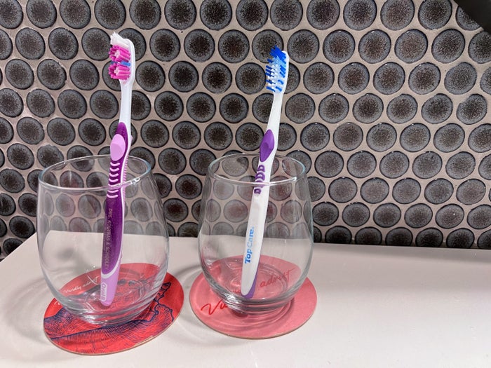 Use glasses as toothbrush holders