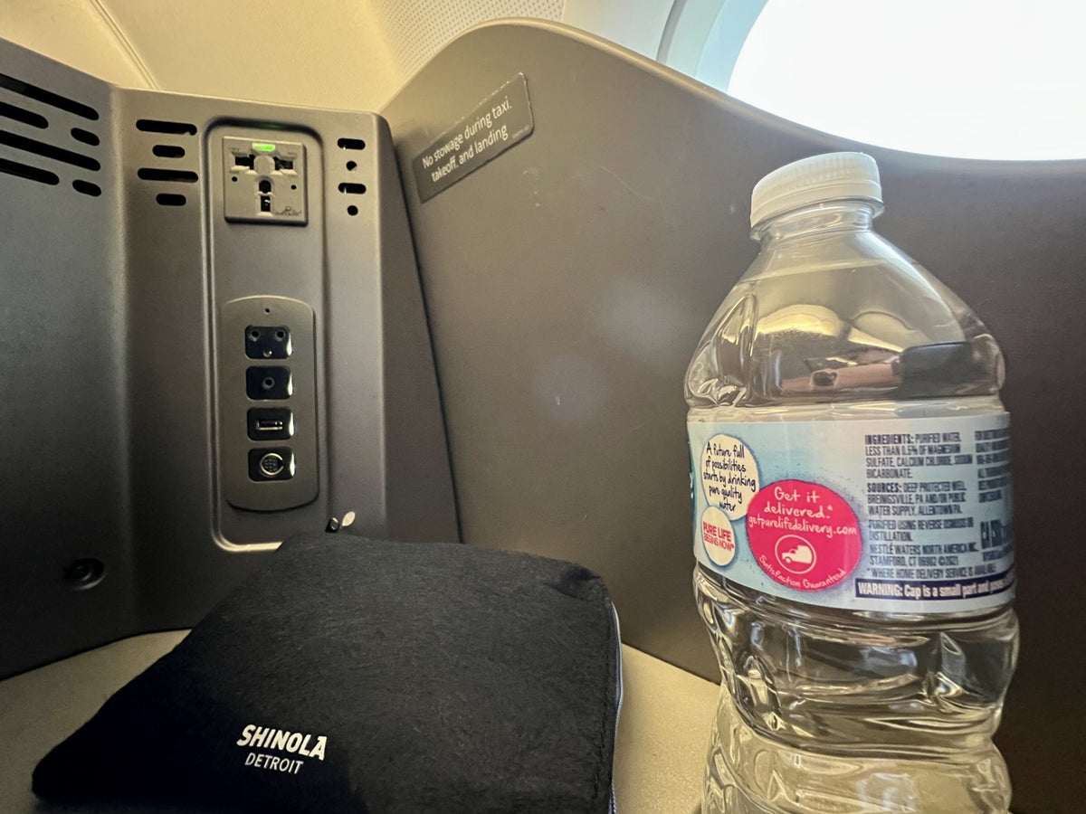 American Airlines A321T Flagship Business amenity kit and water