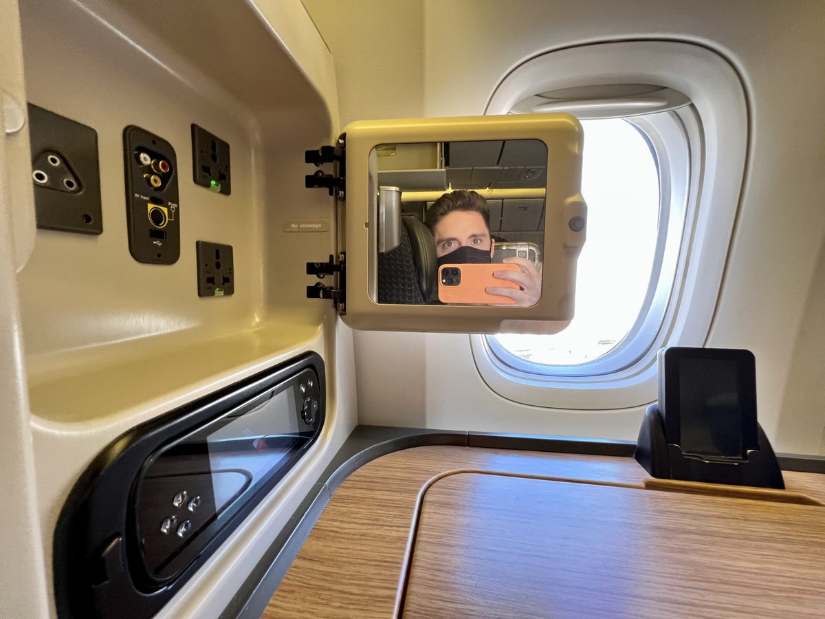 American Airlines Boeing 777 300 Flagship First power outlets and mirror