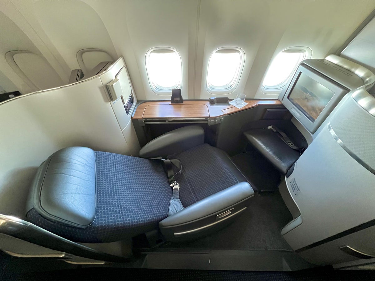 American Airlines Boeing 777 300 Flagship First seat 1A half reclined