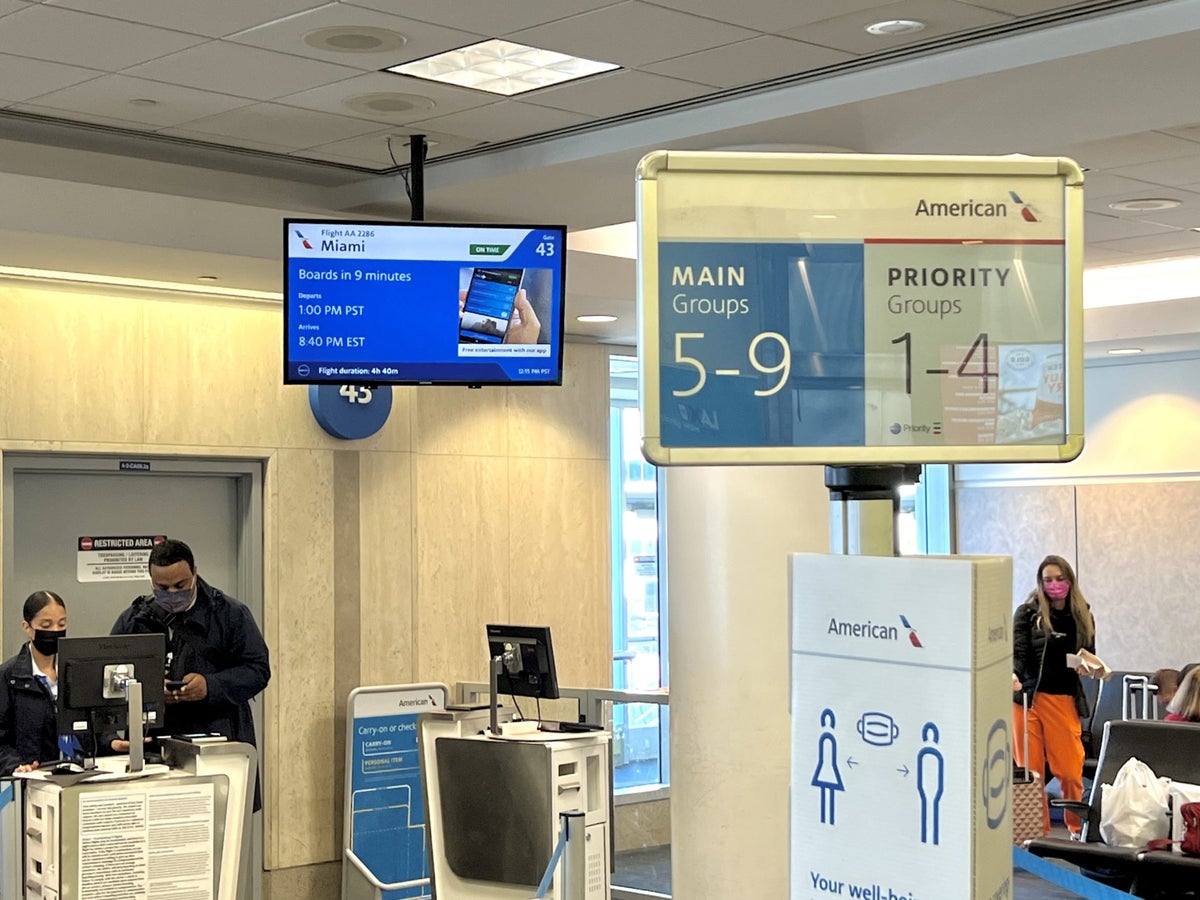 American Airlines Flagship First LAX boarding gate priority boarding singage