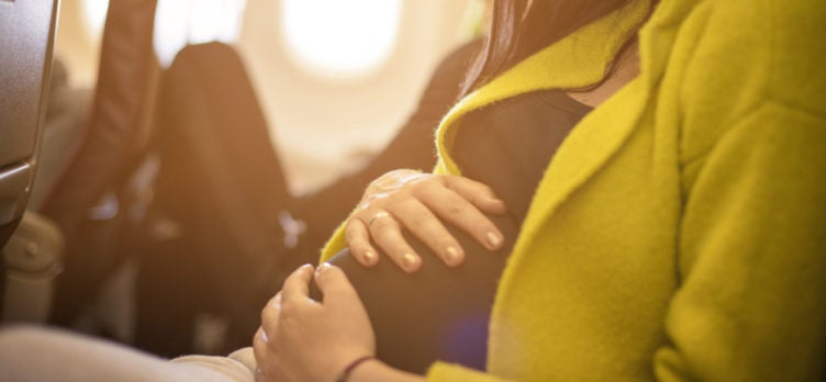 Pregnant woman on plane