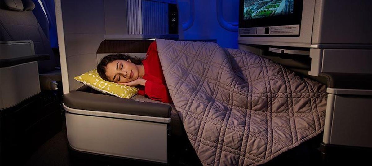 TAP Air Portugal Business Class passenger sleeping