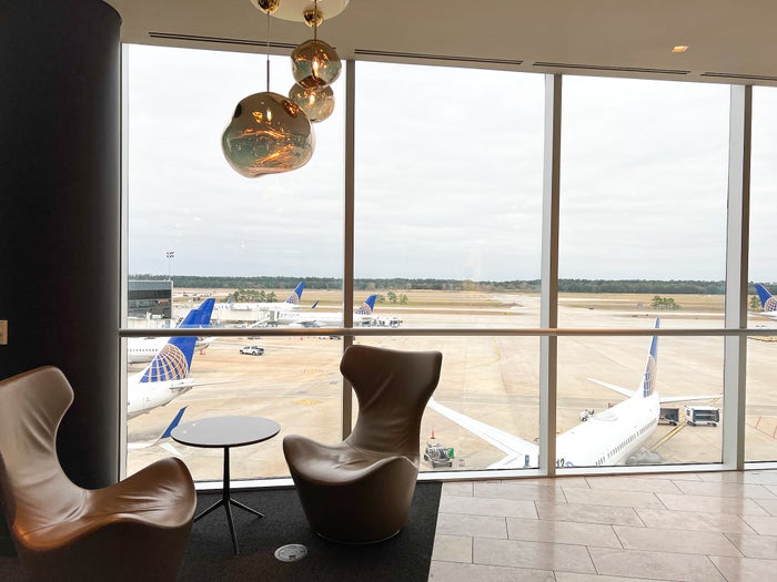 United Polaris Lounge Houston IAH chair with tarmac view