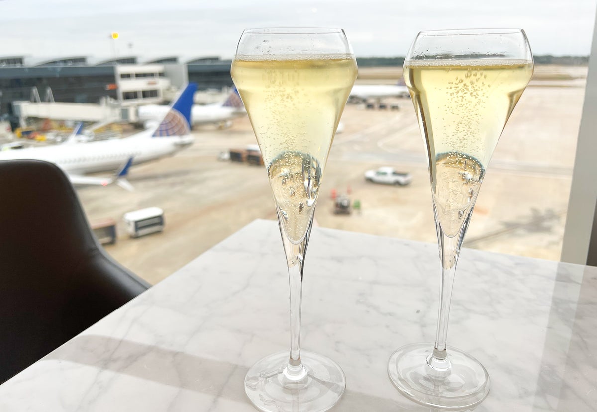 United Polaris Lounge Houston IAH champagne tarmac view