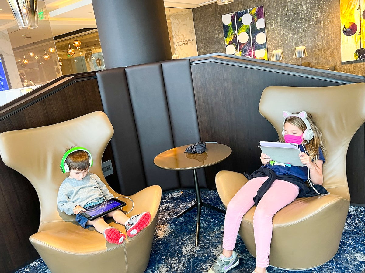 United Polaris Lounge Houston IAH kids on tablets