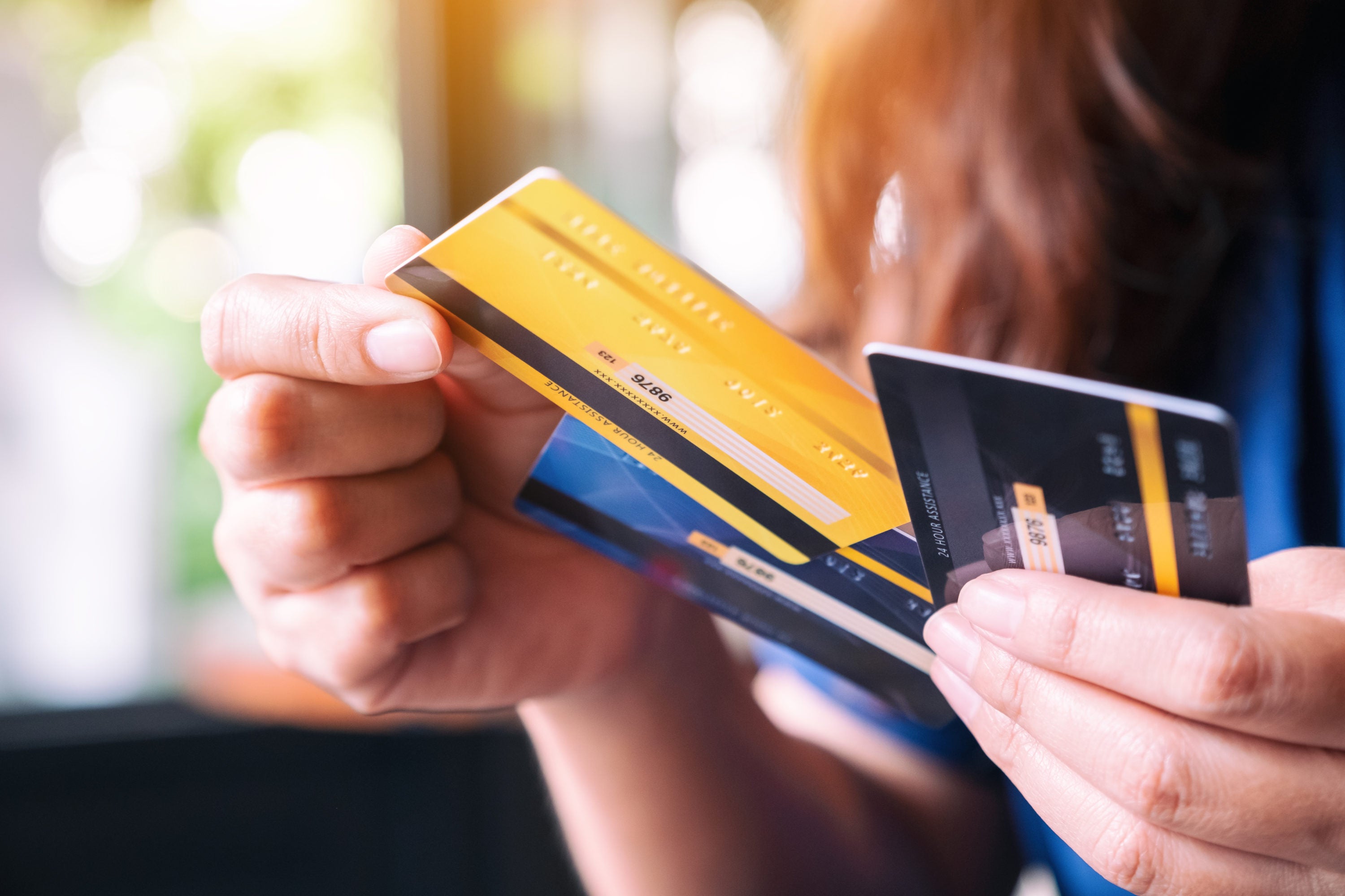 Woman choosing credit cards