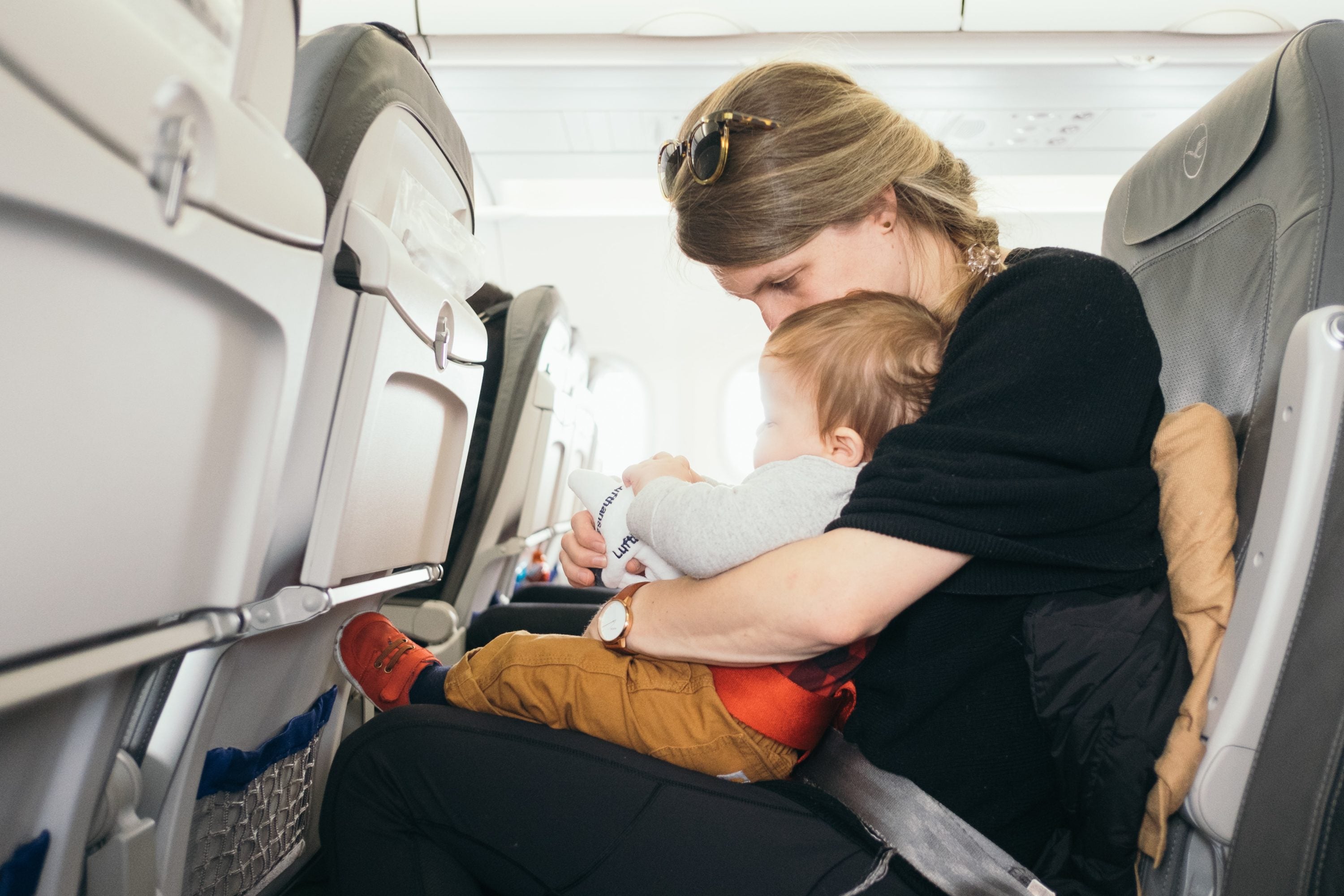 mother and child on airplane