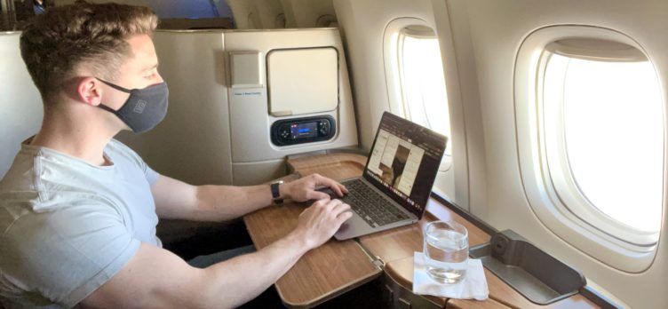 American Airlines Boeing 777 300 Flagship First working on laptop from seat 1A