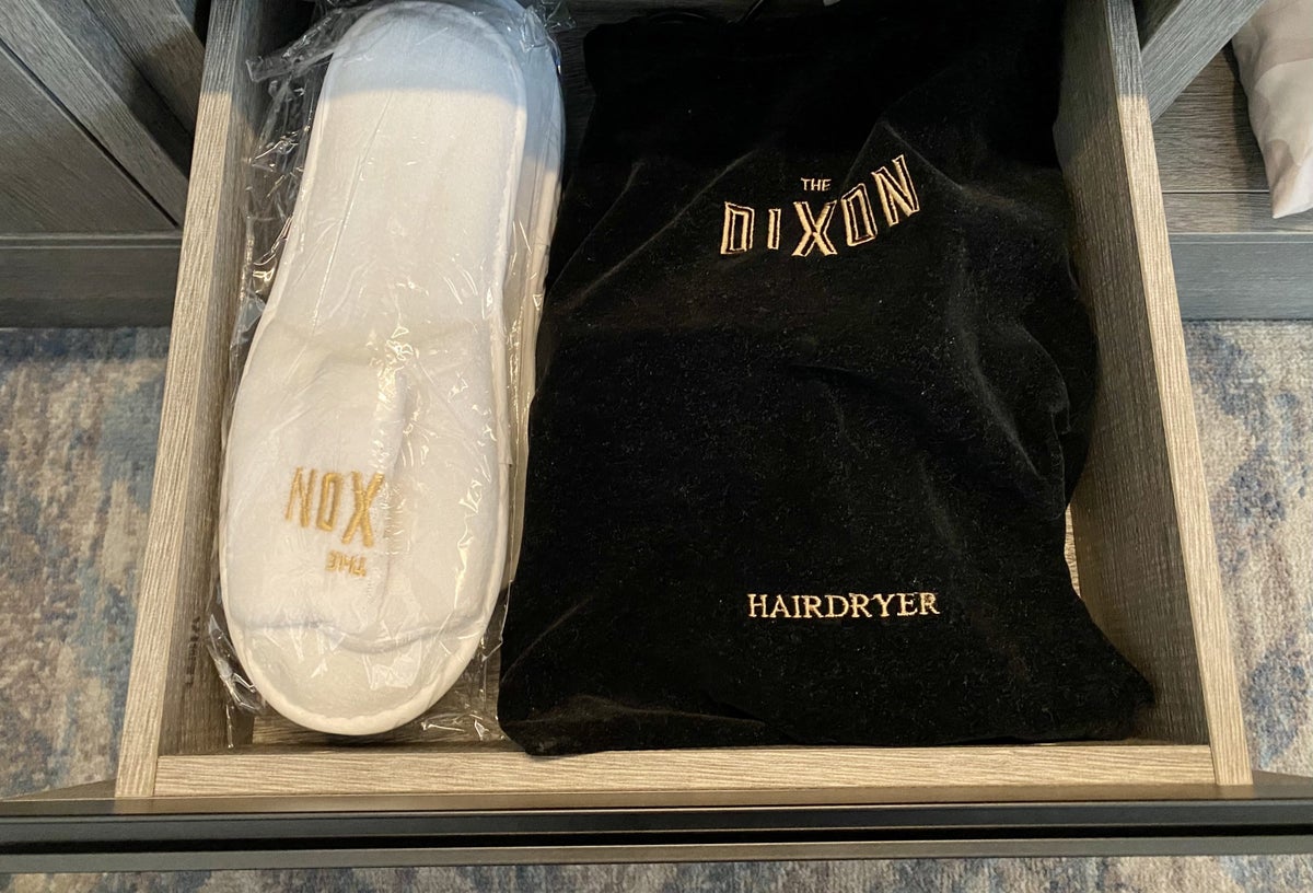 The Dixon London Autograph Collection bedroom slippers and hairdyer