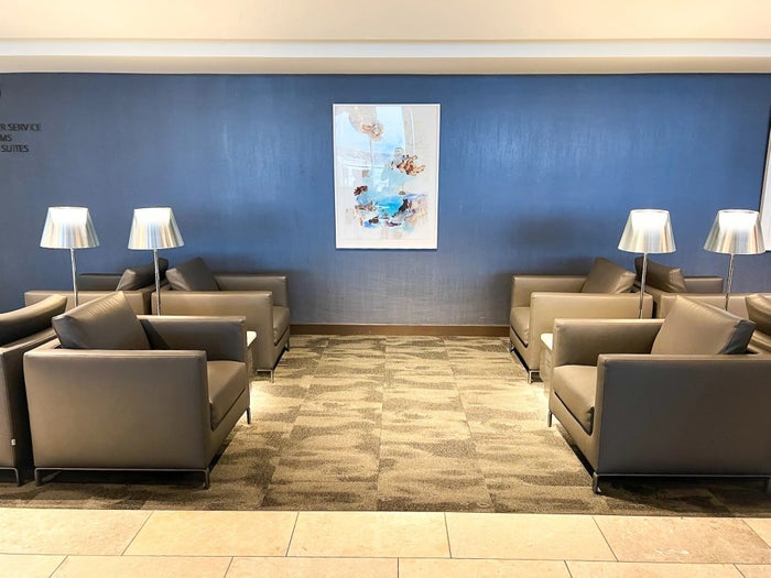 United Polaris Lounge Houston IAH arm chairs