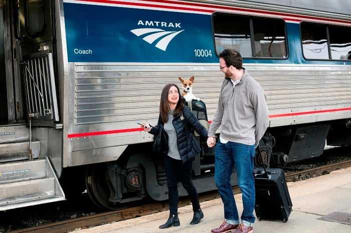 Amtrak couple with dog Amtrak couple with dog