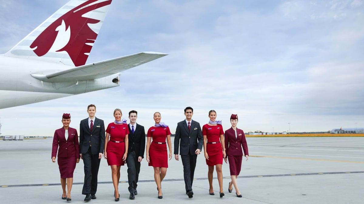 Qatar and Virgin Flight Attendants Walking