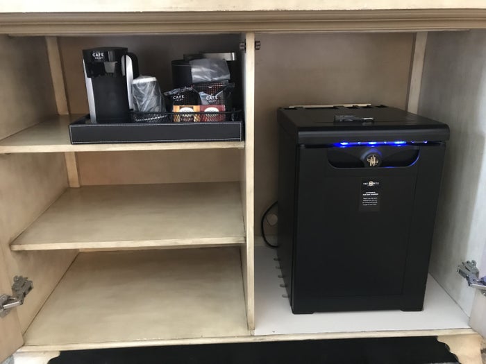 Coffee and tea maker, minibar inside the dresser