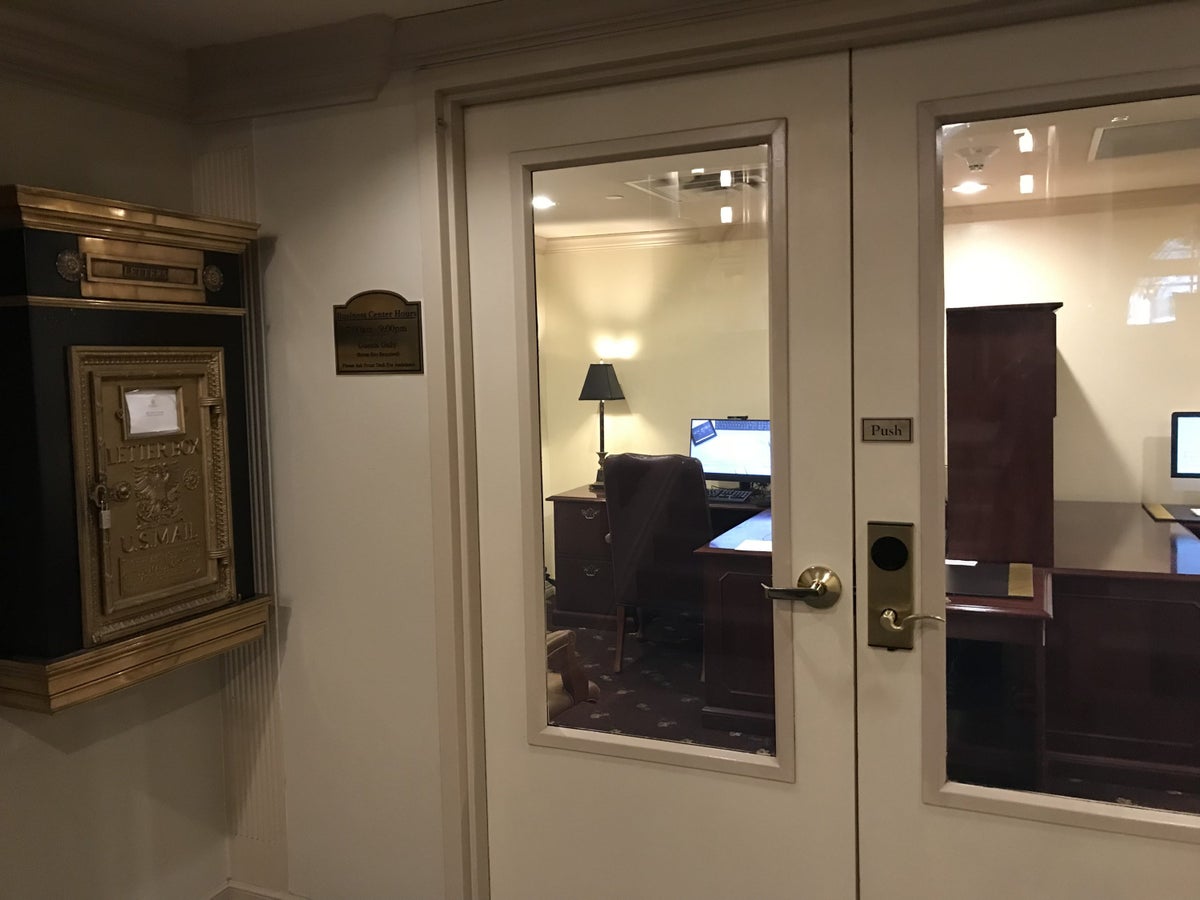 Doors to the Driskill business center and mailbox