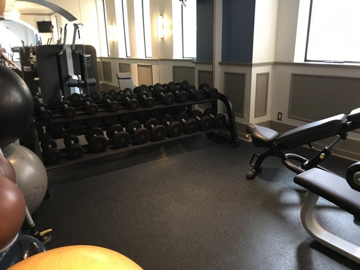 Free weights and balance balls at The Driskill Hotel gym.