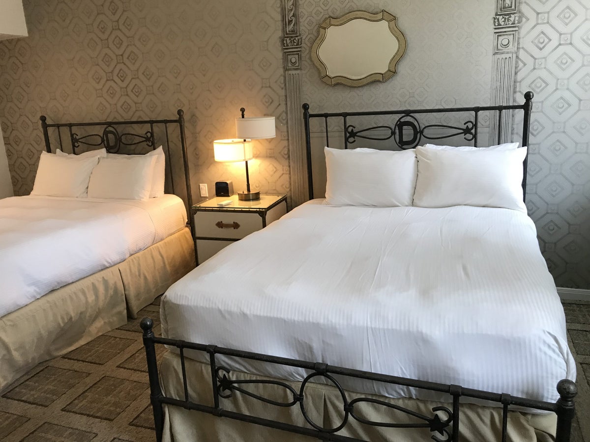 Queen bed room at The Driskill Austin