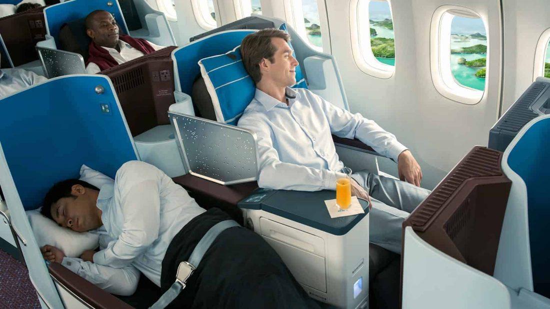 KLM business class male passenger lie flat relaxing