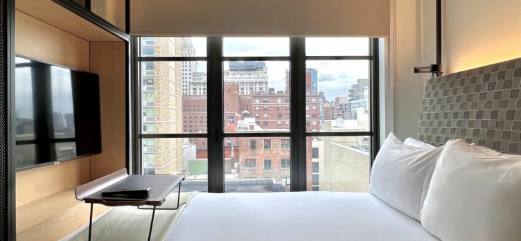 Moxy East Village bedroom bed view by day